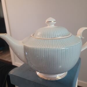 Elegant White and Gold Teapot